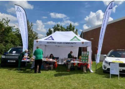Serving Our Community — CRL stand